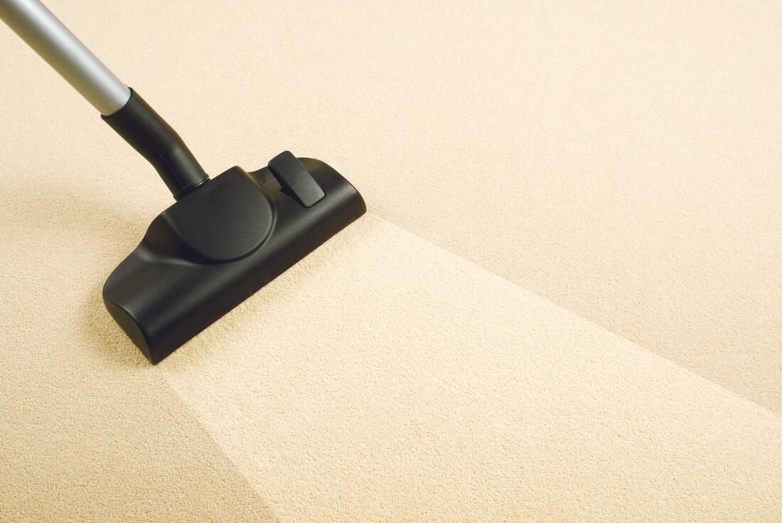 a vacuum showing to clean the carpet
